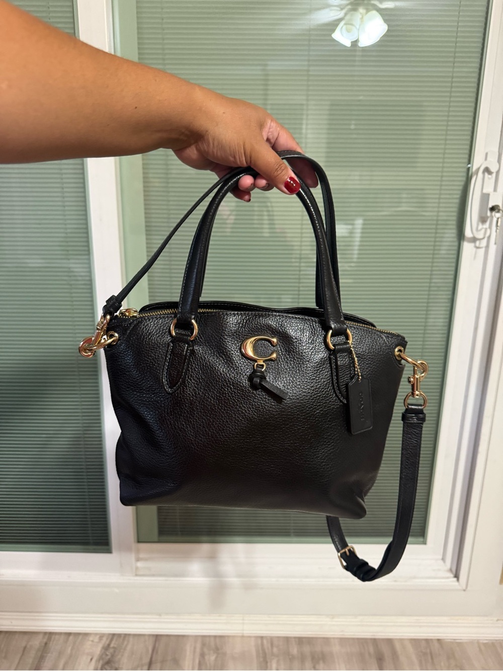 Coach Black Pebbled Leather Satchel with Gold Accent
